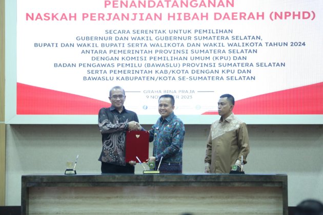 Sumsel  Daerah Yang Pertama Kali Lakukan Penandatanganan Serentak NPHD Dana Pilkada Tahun 2024 Provinsi dan Kabupaten/Kota