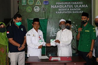 Kominfo Banjar Bekali Masyarakat Pengetahuan Covid-19 Lewat Buku Saku Berbahasa Daerah